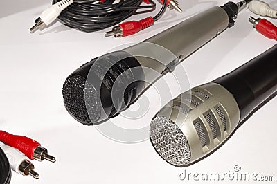 Two microphones that are electroacoustic devices that convert acoustic vibrations Stock Photo