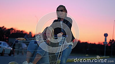 Man Have Fun on the Parking Shopping Mall. Happy Funny Guy Rides on Shopping  Cart Stock Video - Video of hypermarket, shopping: 122316875