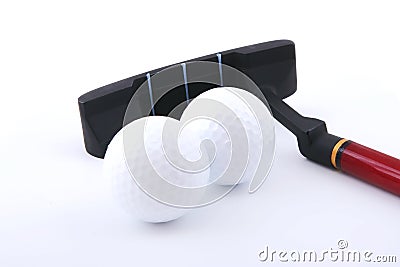 Two mini golf balls and club Stock Photo