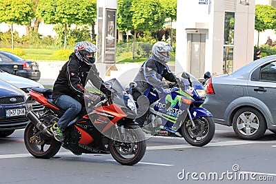Two motorcyclists in traffic Editorial Stock Photo