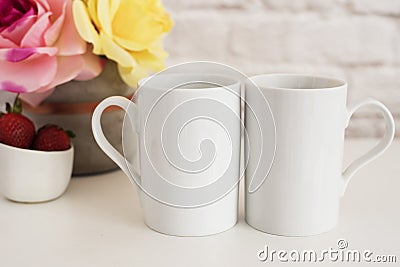 Two Mugs. White Mugs Mockup. Blank White Coffee Mug Mock Up. Styled Photography. Coffee Cup Product Display. Two Coffee Mugs On Wh Stock Photo