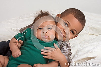Two multiethnic boys brothers Stock Photo