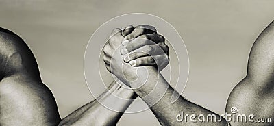 Two muscular hands. Rivalry concept. Hand, rivalry, vs, challenge, strength comparison. Man hand. Two men arm wrestling Stock Photo