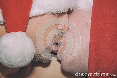 Two men kissing. Chrismas and New Year Stock Photo