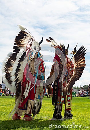 Two Native American Men in Full Regalia at the Little Shell Chippewa Pow Wow in Great Falls, Montana Editorial Stock Photo