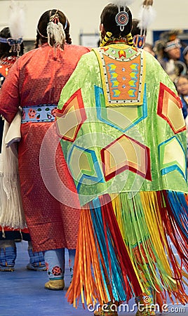 Two Native American Pow Wow Dancers with Ribbon Shawls Editorial Stock Photo