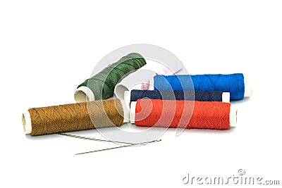 Two needles and six colorful core threads Stock Photo