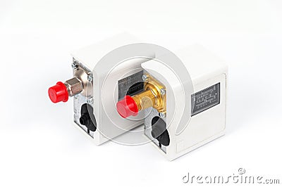 Two new identical pressure switches in the pipeline for monitoring and balancing the pipeline pressure with mechanical Stock Photo