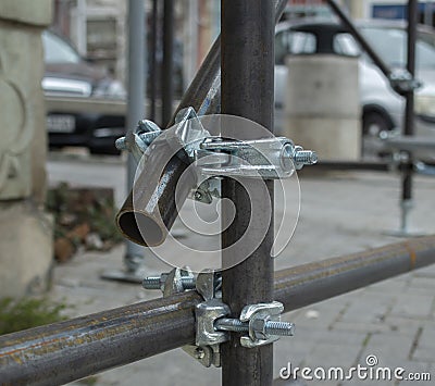 Two new scaffold double fix clamp and scaffold pipes for build the temporary structure Stock Photo
