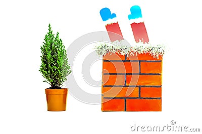 On a white isolated background red brick pipe and a small live Christmas tree Stock Photo