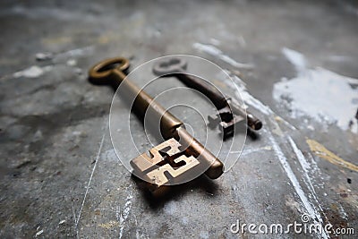 Old Brass Keys on Industrial Work Bench Stock Photo