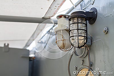 Two Old Yellow deck lamp bulkhead light. Stock Photo