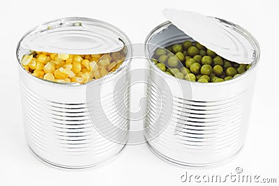 Two open cans with corn and peas on a white background. Copy, empty space for text Stock Photo