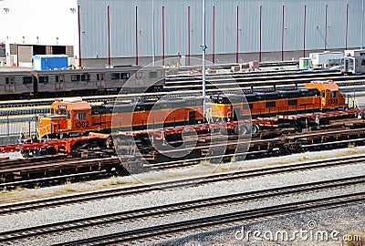 Two orange train engine cars coupled Editorial Stock Photo