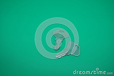 Two pair stainless lock isolated on green Stock Photo