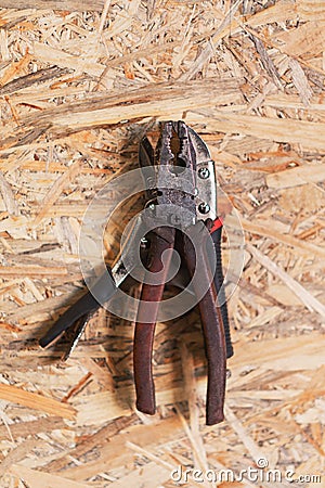 Two pairs of old dirty pliers Stock Photo