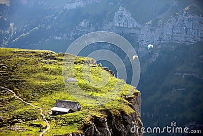 Two para gliders in swiss alps Stock Photo