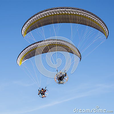 Two paraglider blue sky moto Stock Photo