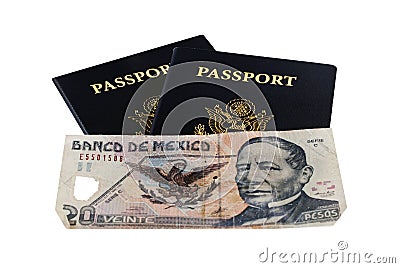 Two Passports with Pesos Stock Photo