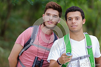 Two people hike in french alps Stock Photo