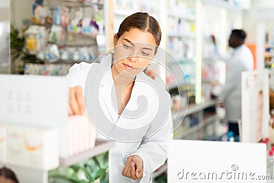 Pharmacists putting drug packages in order Stock Photo