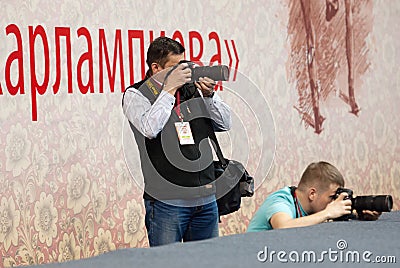 Two photographers Editorial Stock Photo