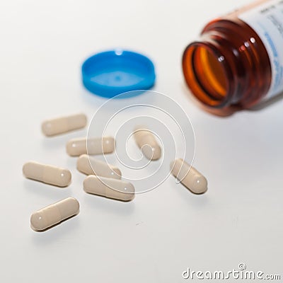 Two-piece telescoping gelatin capsules on white background. Stock Photo