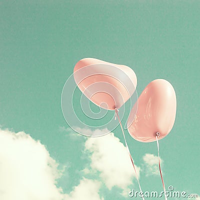 Two Pink Heart-shaped balloons Stock Photo