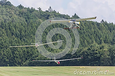 Two sailplanes beeing towed from a motorplane Stock Photo