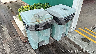 Two plastic bins that looked old and dirty Stock Photo