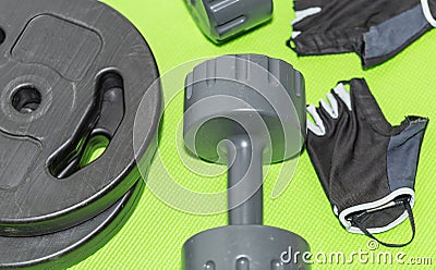 Two Plastic Weights, Fitness Gloves, Weights 4 Stock Photo