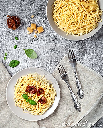 Two plates of prepared spaghetti Stock Photo