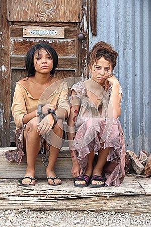 Two Poor young girls Editorial Stock Photo