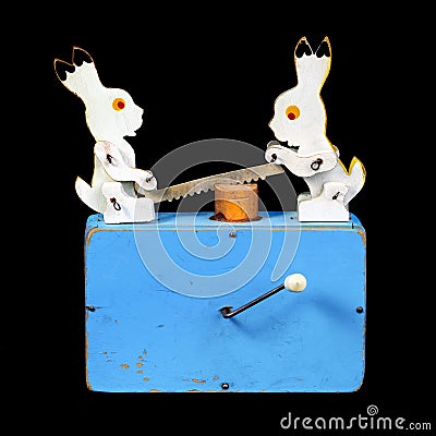 Two rabbits sawing a log Stock Photo