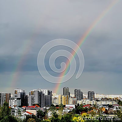 Two rainbows over the city Stock Photo