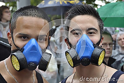 Two Ravers with gasmasks at the Streetparade in ZÃ¼rich Editorial Stock Photo