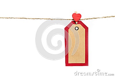 Two red and brown paper tags hanging on the rope by heart shape Stock Photo