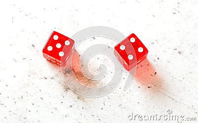 Two red craps dices showing Centerfield Nine Nina number 5 and 4 overhead shot on white board Stock Photo