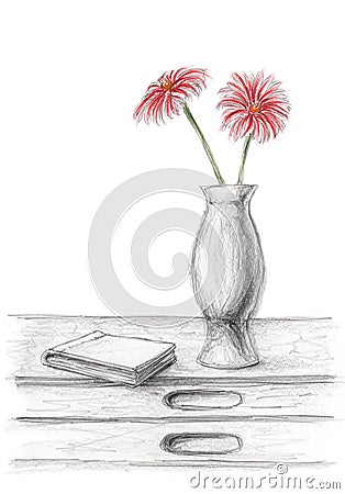 Two red flowers in a vase on desk with book Stock Photo