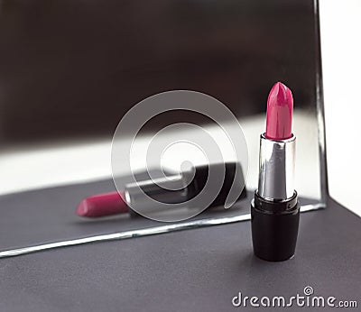 Two red lipsticks, perfect versus imperfect symbolic concept ide Stock Photo