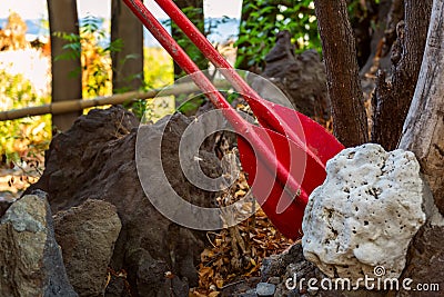 two red oars as a detail of hotel decoration. Outside asian style interior. Stock Photo