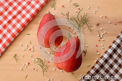 Two red pears on a wooden table like christmas nuance Stock Photo