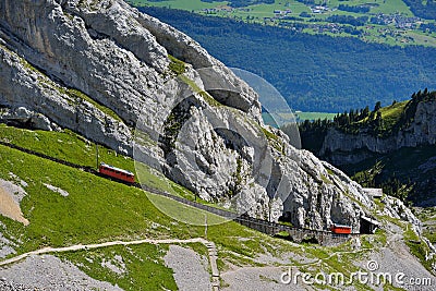 The two red Pilatus train, the world's steepest cogwheel railway Stock Photo