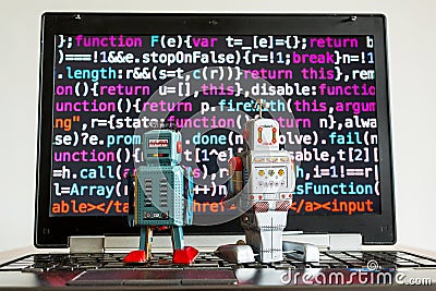 Robots with source code screen, artificial intelligence, deep learning concept Stock Photo