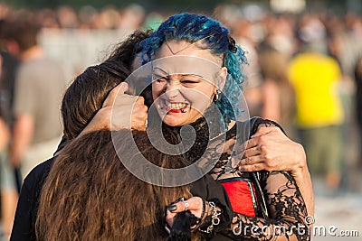Two rock fans at Tuborg Green Fest Editorial Stock Photo