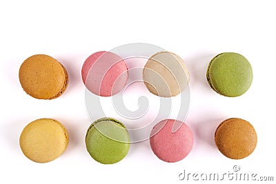 Two rows of colorful French macarons. Stock Photo