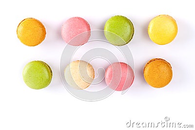 Two rows of colorful French macarons. Stock Photo