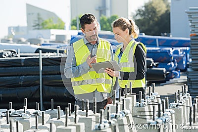 two safety specialists monitoring perimeter petrochemical refinary Stock Photo