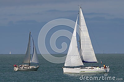 Two sailboats on the open sea Stock Photo