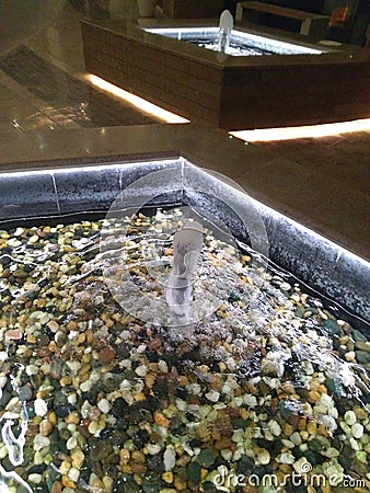 Two sam Water fountains with gobble stones of different colors Stock Photo